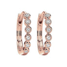circular milgrain diamond earrings in 10k rose gold (1/7 ct. tw.)