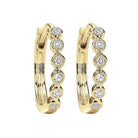 circular milgrain diamond earrings in 10k yellow gold (1/7 ct. tw.)