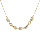 14KY 7 Link Station Necklace with Baguette and Round Diamonds 1/2 CTW