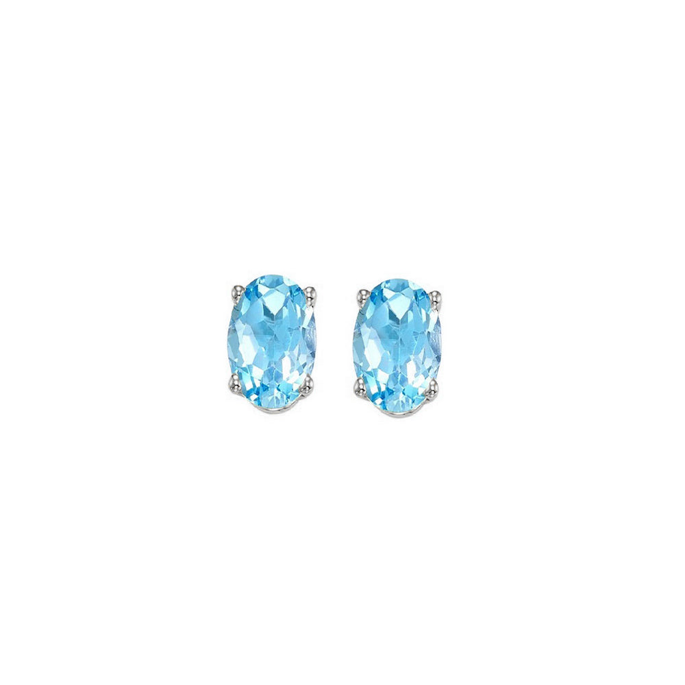 oval prong set blue topaz studs in 14k white gold