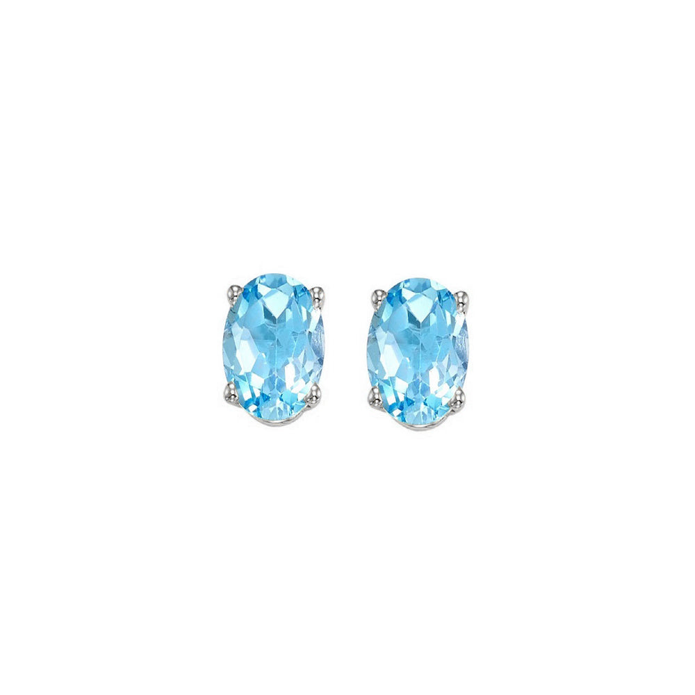 oval prong set blue topaz studs in 14k white gold