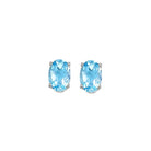 oval prong set blue topaz studs in 14k white gold