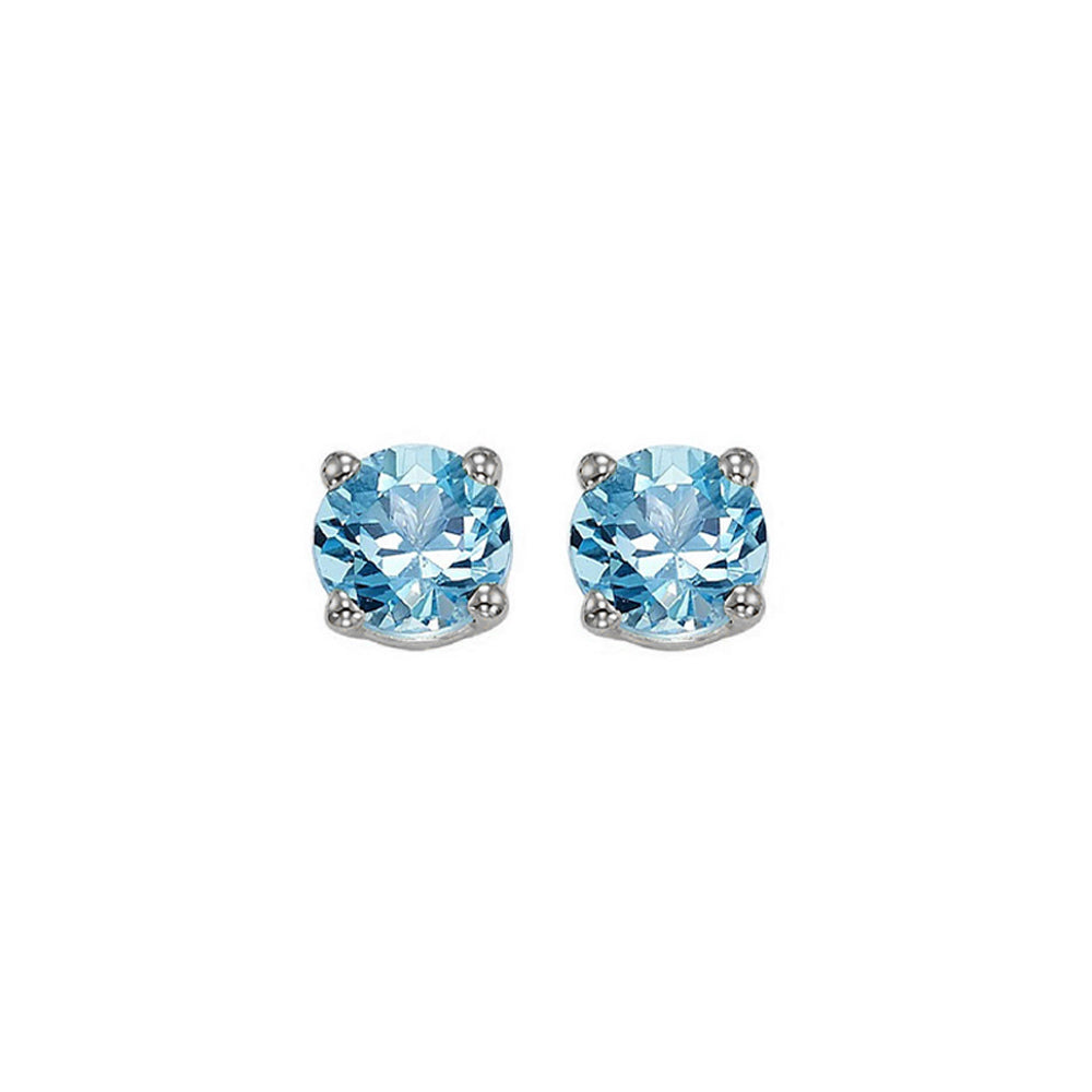 round prong set blue topaz studs in 14k white gold