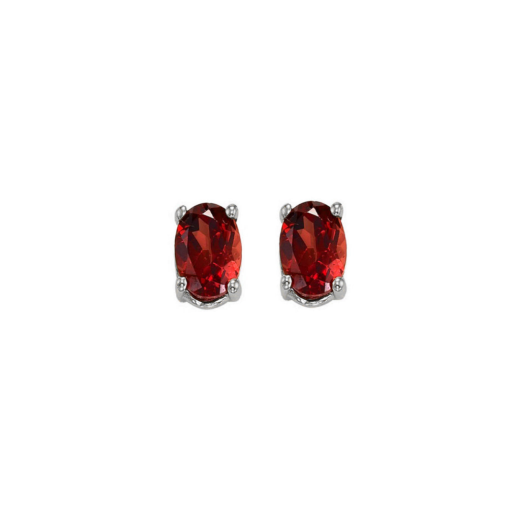 oval prong set garnet studs in 14k white gold