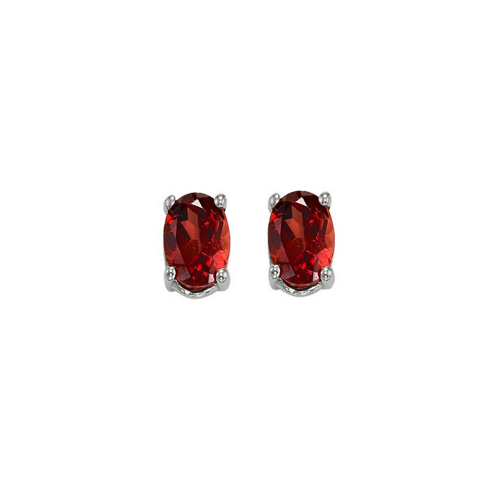 oval prong set garnet studs in 14k white gold