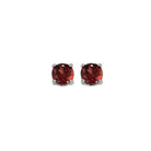 four prong garnet studs in 14k white gold (4 mm)