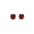 four prong garnet studs in 14k white gold (4.5 mm)