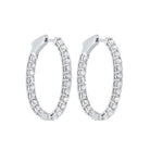 diamond inside out oval hoop earrings in 14k white gold (1ctw)