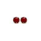 round prong set ruby stud earrings in 14k white gold