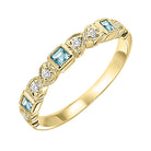 10k yellow gold stackable bezel blue topaz band (1/10 ct. tw.)