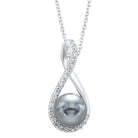 twisting shell pearl pendant in sterling silver